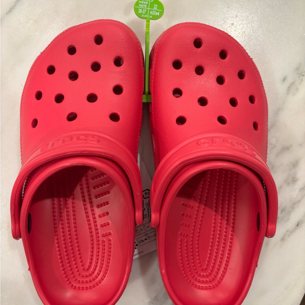 CROCS magenta clogs with Perforated Design and Pivoting Heel Strap